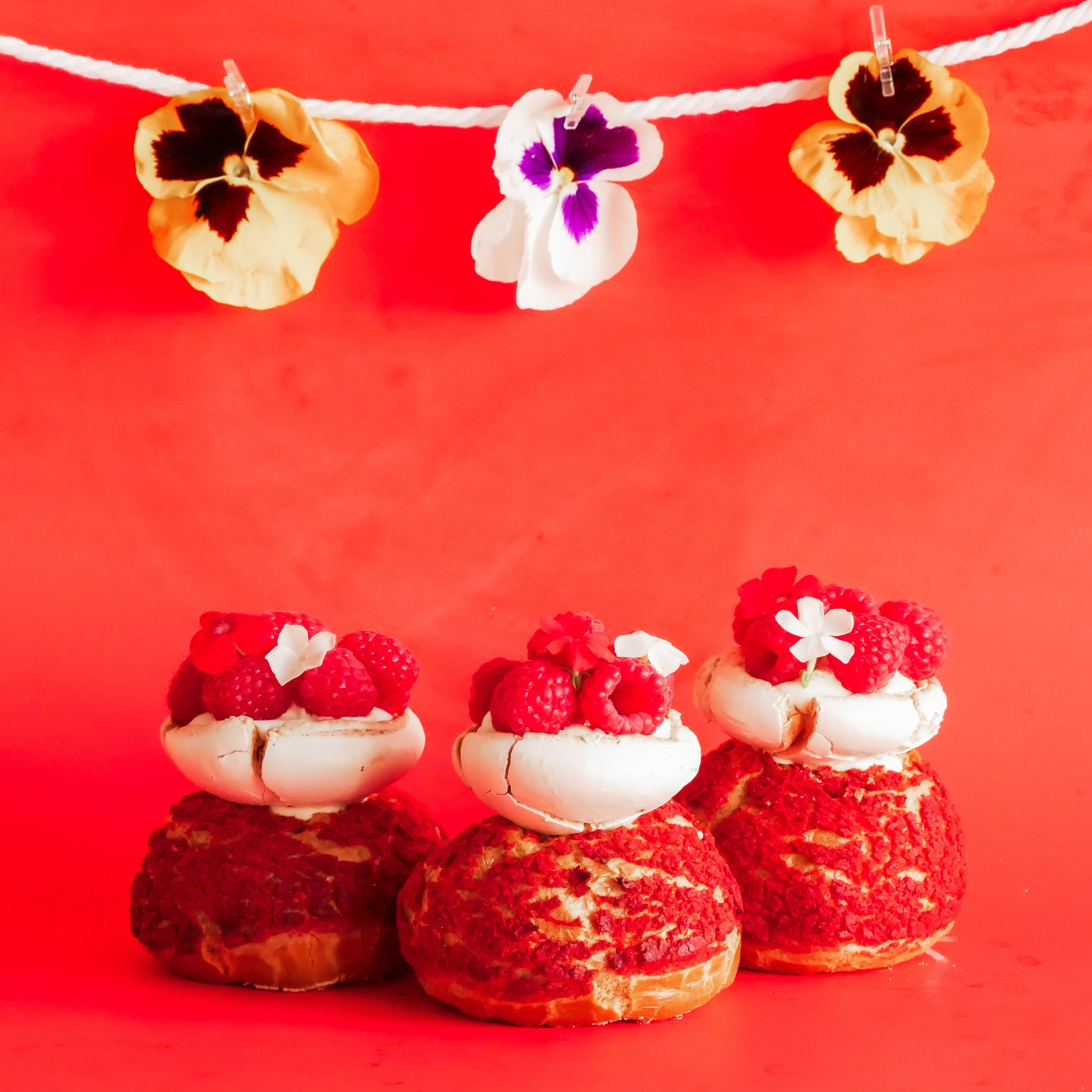 Pavlova cream puffs with raspberries and genmaicha